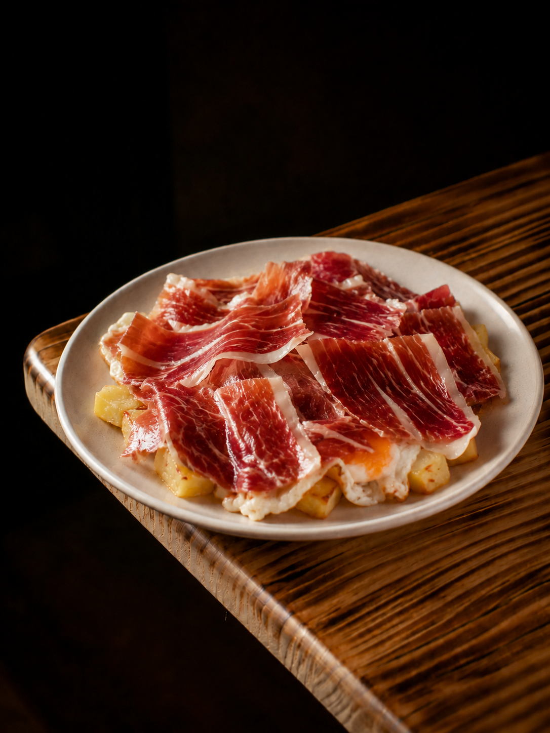 Huevos rotos con jamón ibérico
